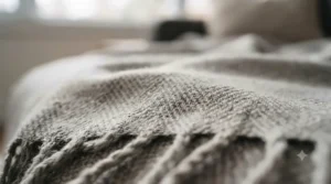 Pet-friendly washable couch blanket protecting a sofa from dog hair and dirt.